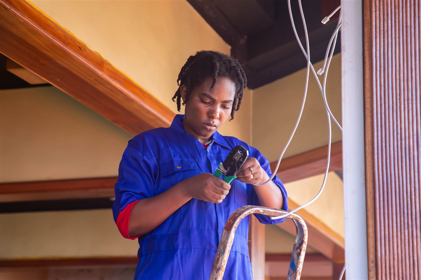 Technician inspecting a home's electrical wiring